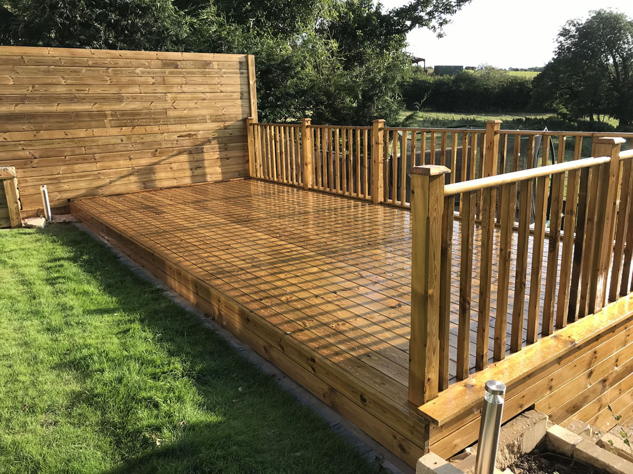 An image of decking in a garden.