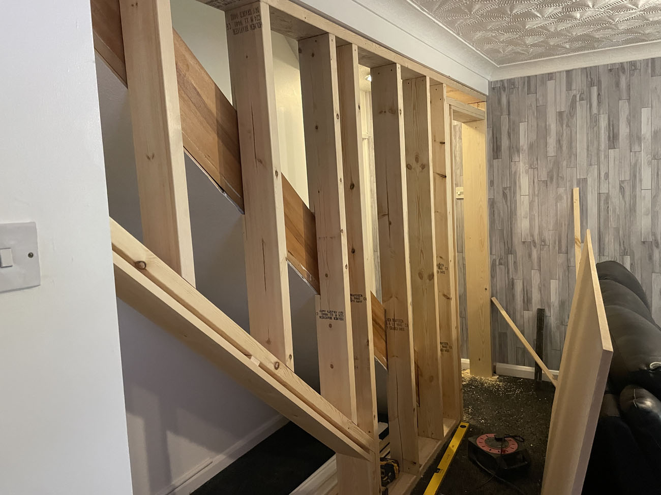 Timber framing image on an interior wall inside of a house.