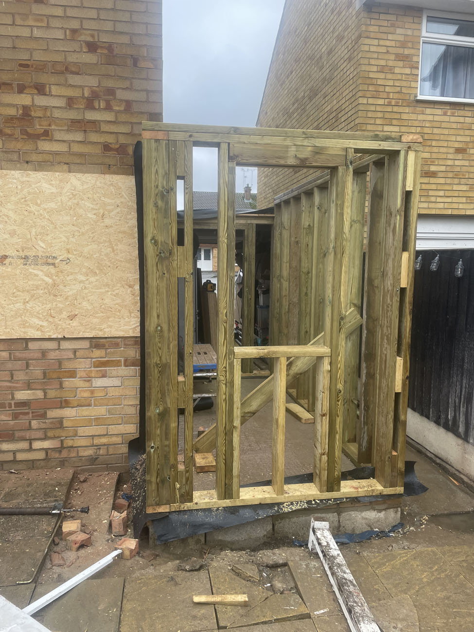 An image of timber framing on the side of the house.